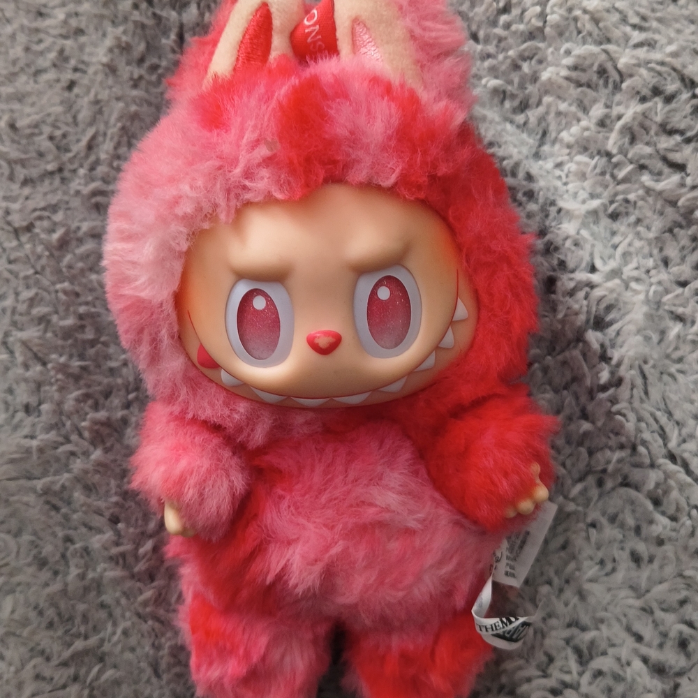 Red and Pink Plush Monster Toy